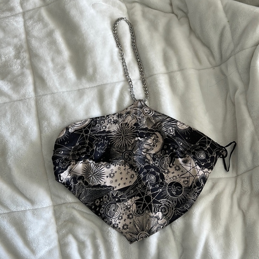 Garage top. With silver chain. Ties at back